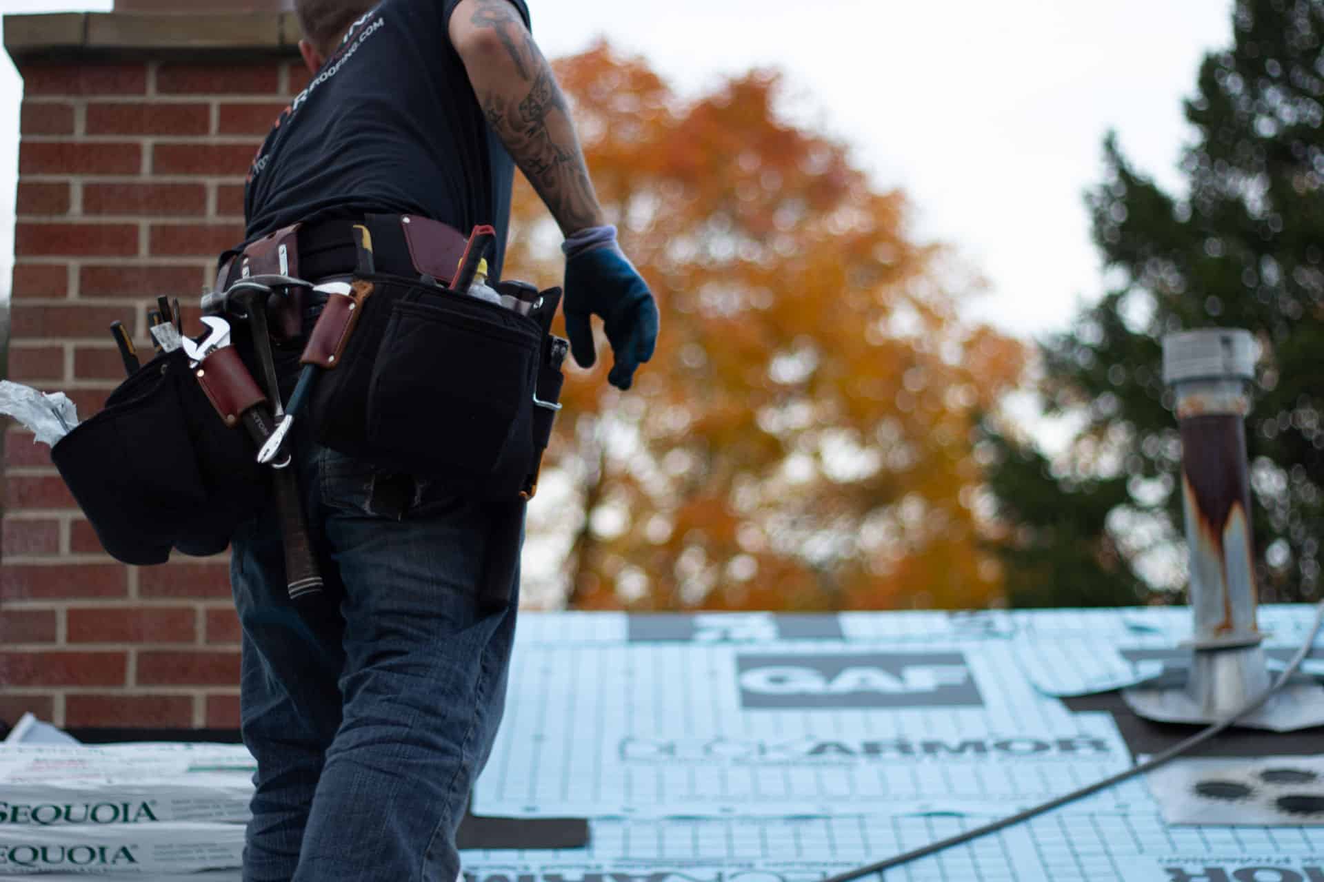 BCM Roofer laying roof deck layers in Orchard Lake Michigan