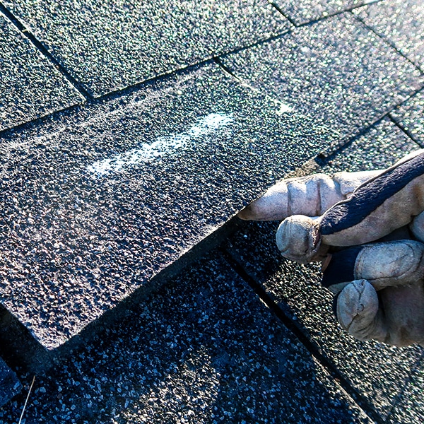 BCM Roofing performs Professional Roof Inspection on a roof in Sylvan Lake Michigan