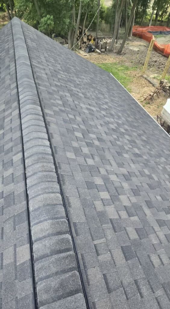 New ridge cap installed on this roof installation in Bloomfield Township