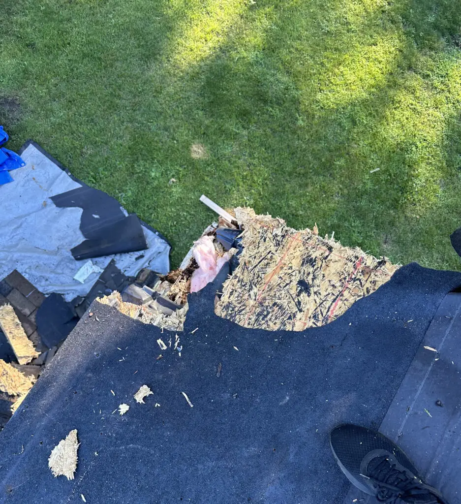 Roof Repair & Installation in Waterford Township with new Skylight 24 close up view of roof decking damage before repair in waterford township mi