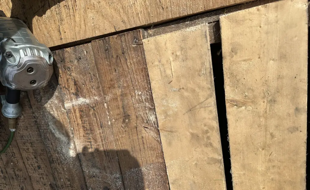 Roof Repair & Installation in Waterford Township with new Skylight 20 detailed view of roof decking boards exposed during residential roof replacement in waterford township mi