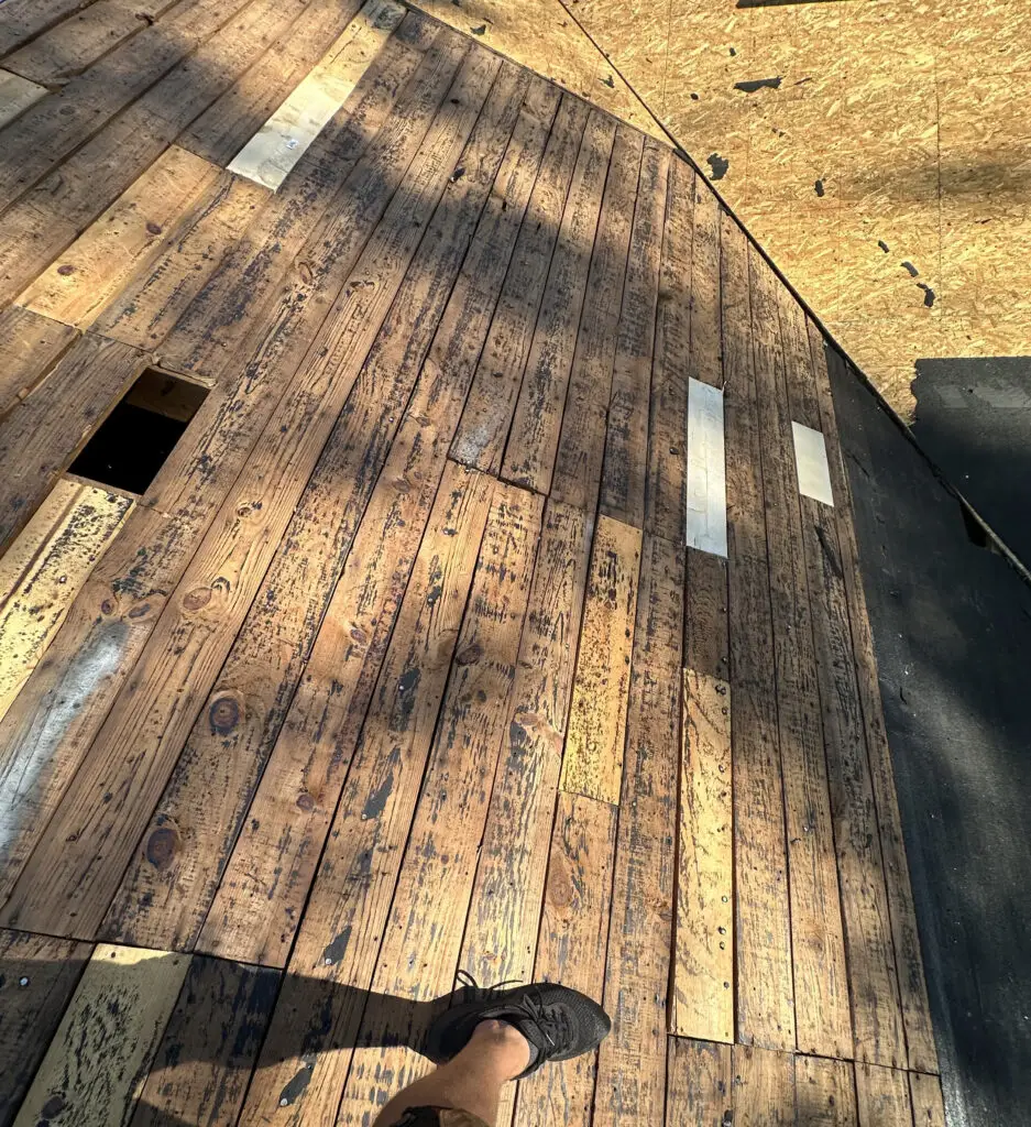 Roof Repair & Installation in Waterford Township with new Skylight 27 exposed roof decking showing recent repair work during roof replacement in waterford township mi