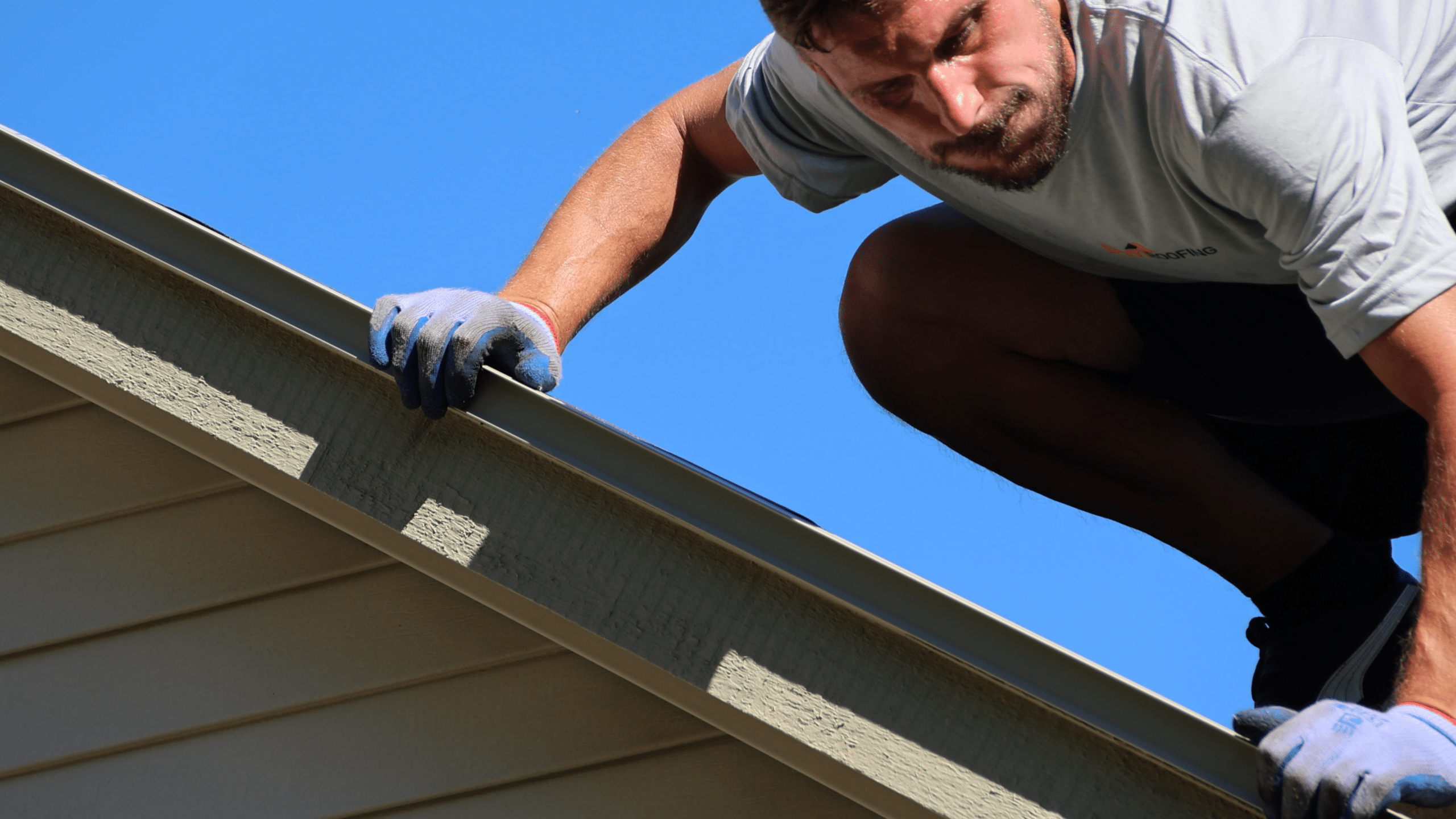BCM Roofing crew member performing a roof inspection