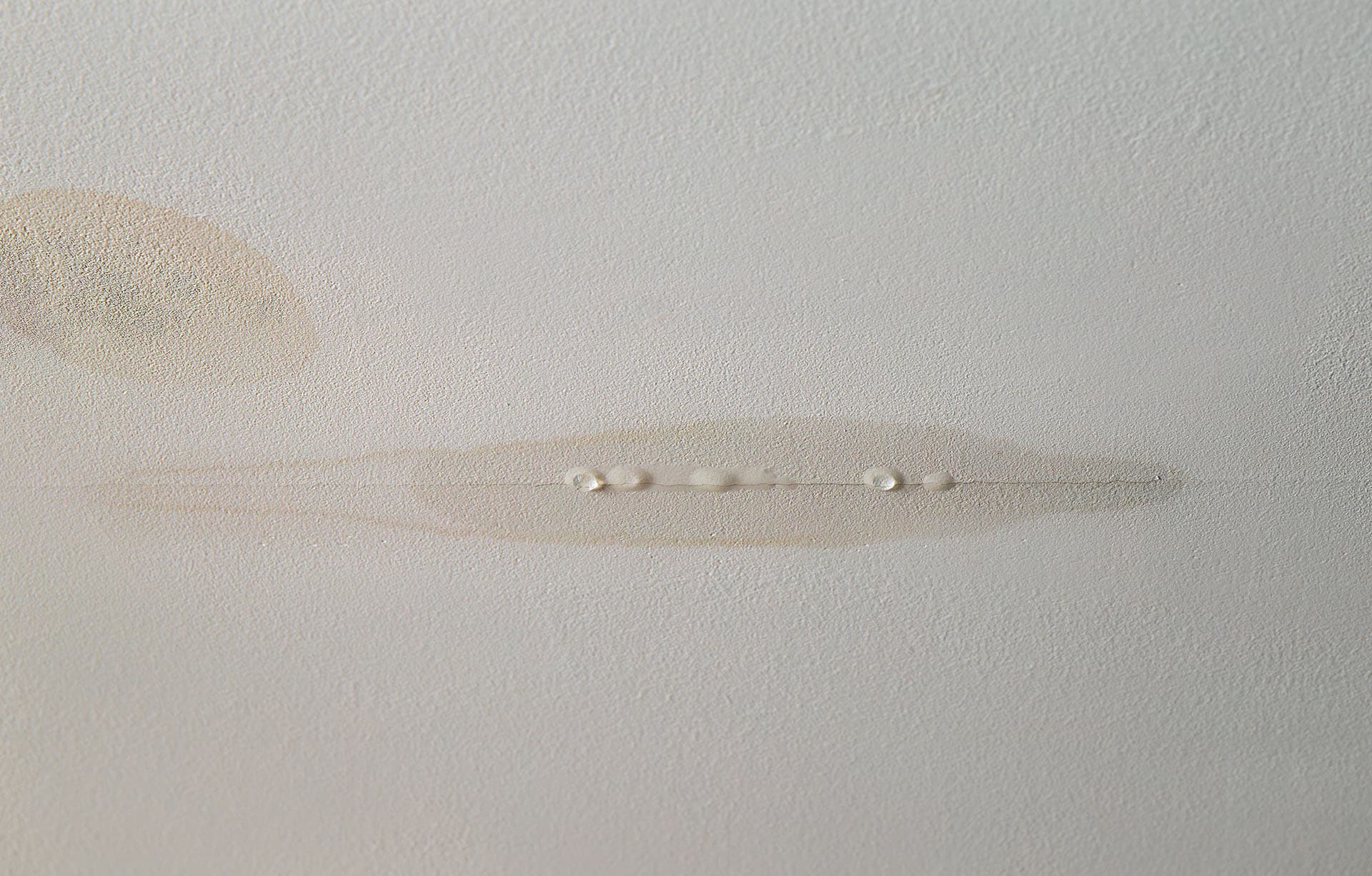 Roof leak repairs not yet performed on this drywall ceiling, causing damage to the home interior.