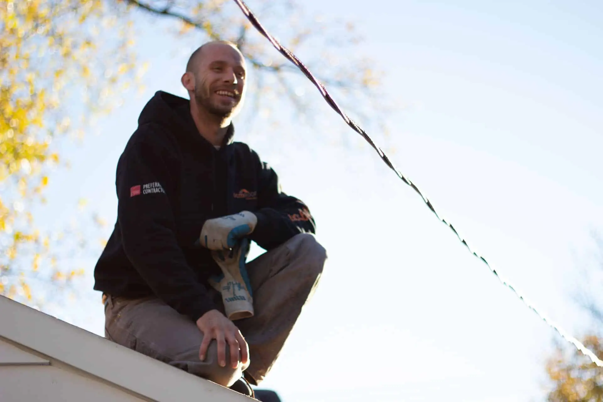 About Us 1 bcm roofer on a roof