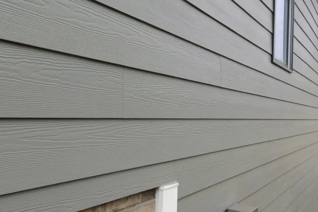 Close-up of clean house exterior showing how to clean vinyl siding effectively for better curb appeal.
