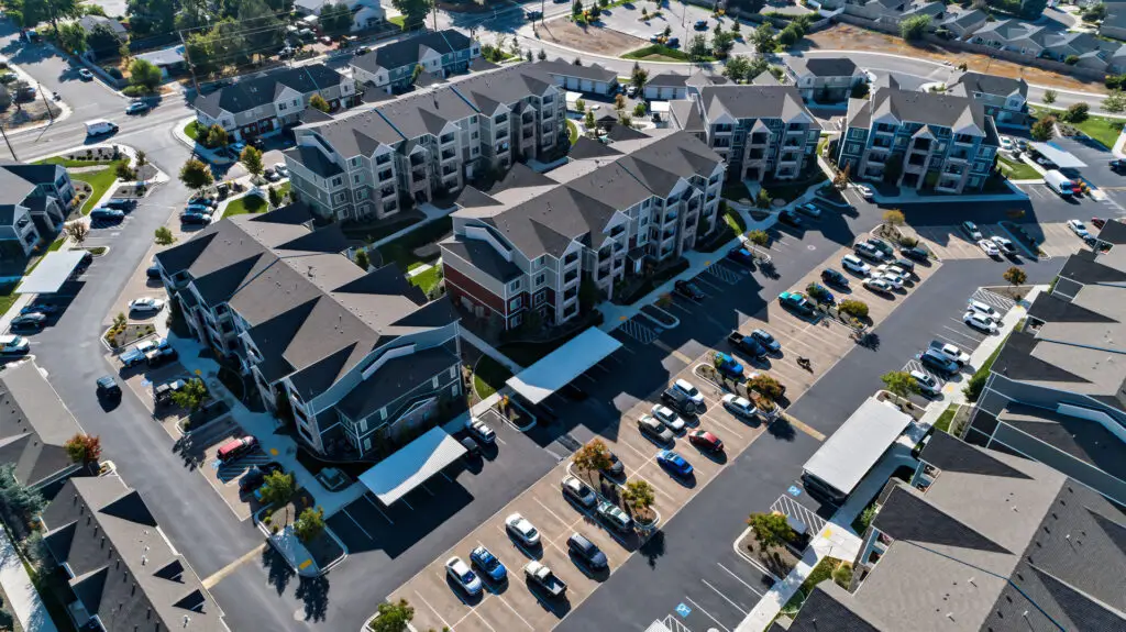 Aerial view of an apartment complex with asphalt shingles.
