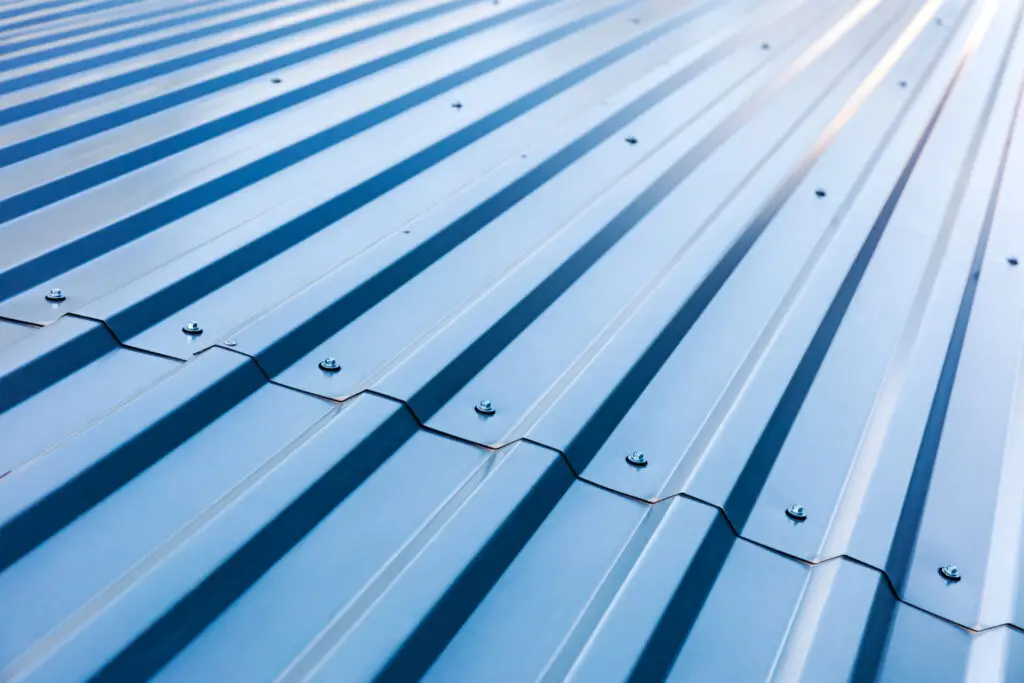 Close-up of corrugated metal roof with rivets.