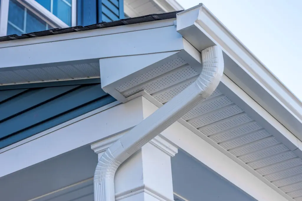 Close up of gutter down spout on a residential home.